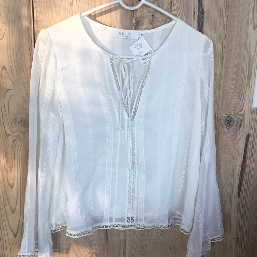 Aster XS new with tags. Fits like a small. White/ivory delicate light weight